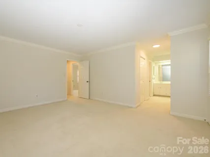 a bathroom with a granite countertop sink mirror and double