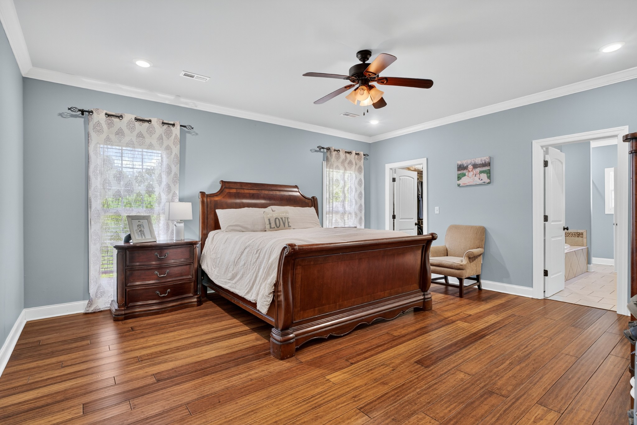 86 L Mitchell Road Kelso, TN 37348 - Photo 19 of 49 a bedroom with a bed and wooden floor