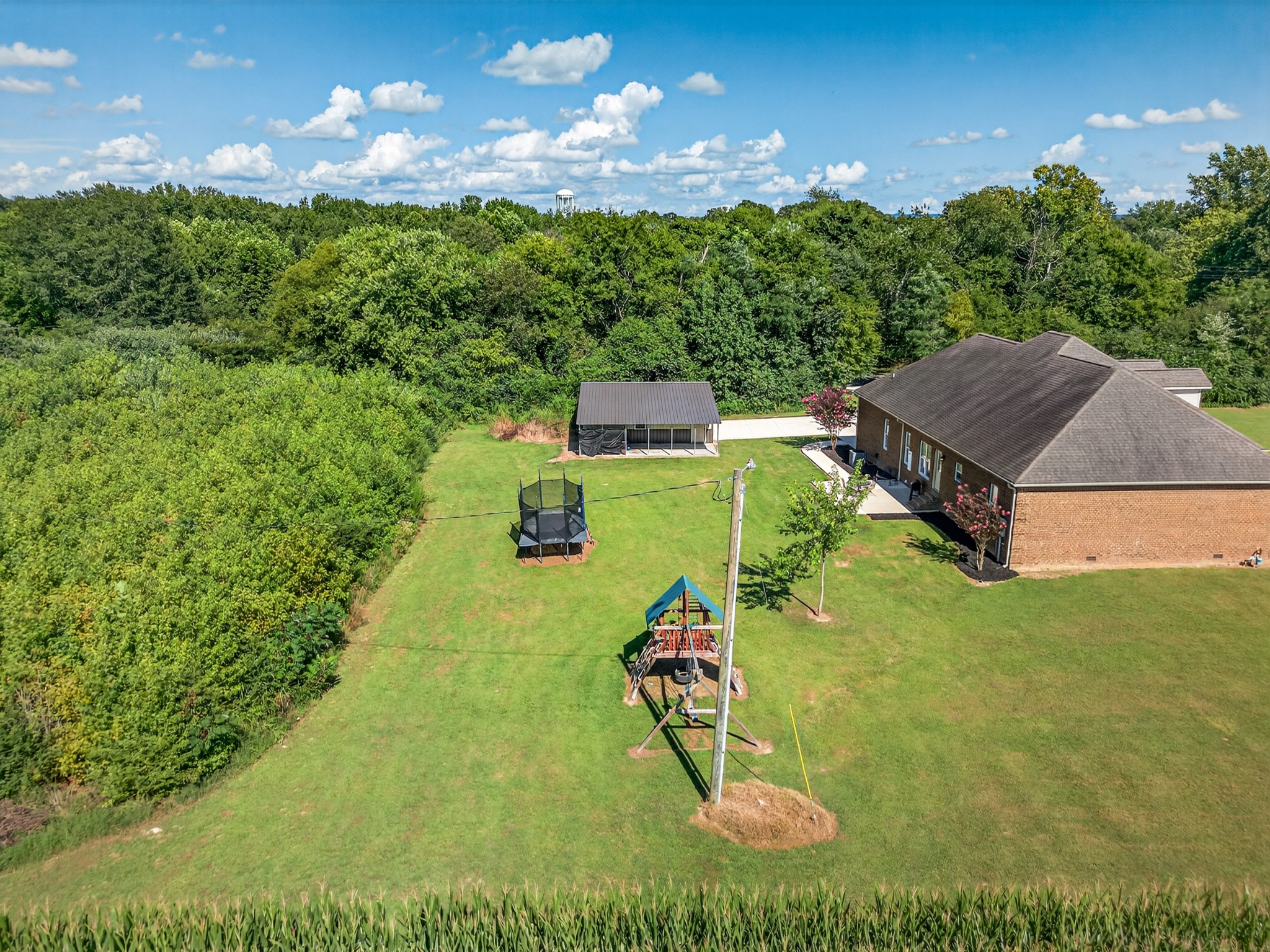 86 L Mitchell Road Kelso, TN 37348 - Photo 44 of 49 a view of a big yard with potted plants