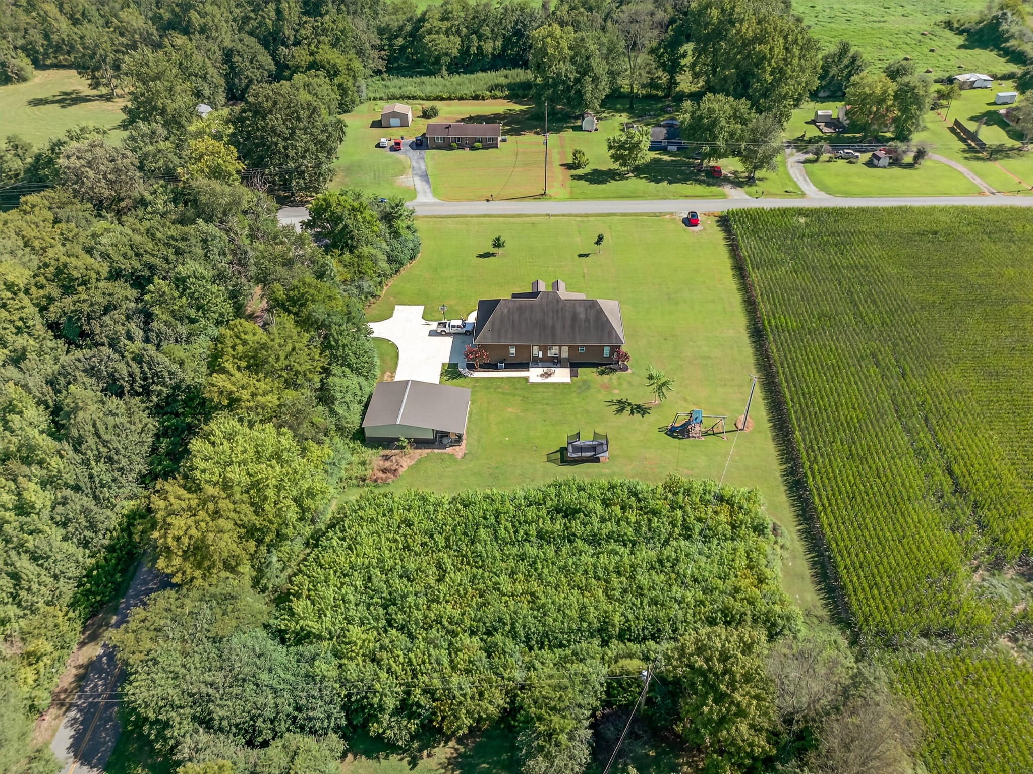 86 L Mitchell Road Kelso, TN 37348 - Photo 48 of 49 an aerial view of a house with a yard basket ball court and outdoor seating