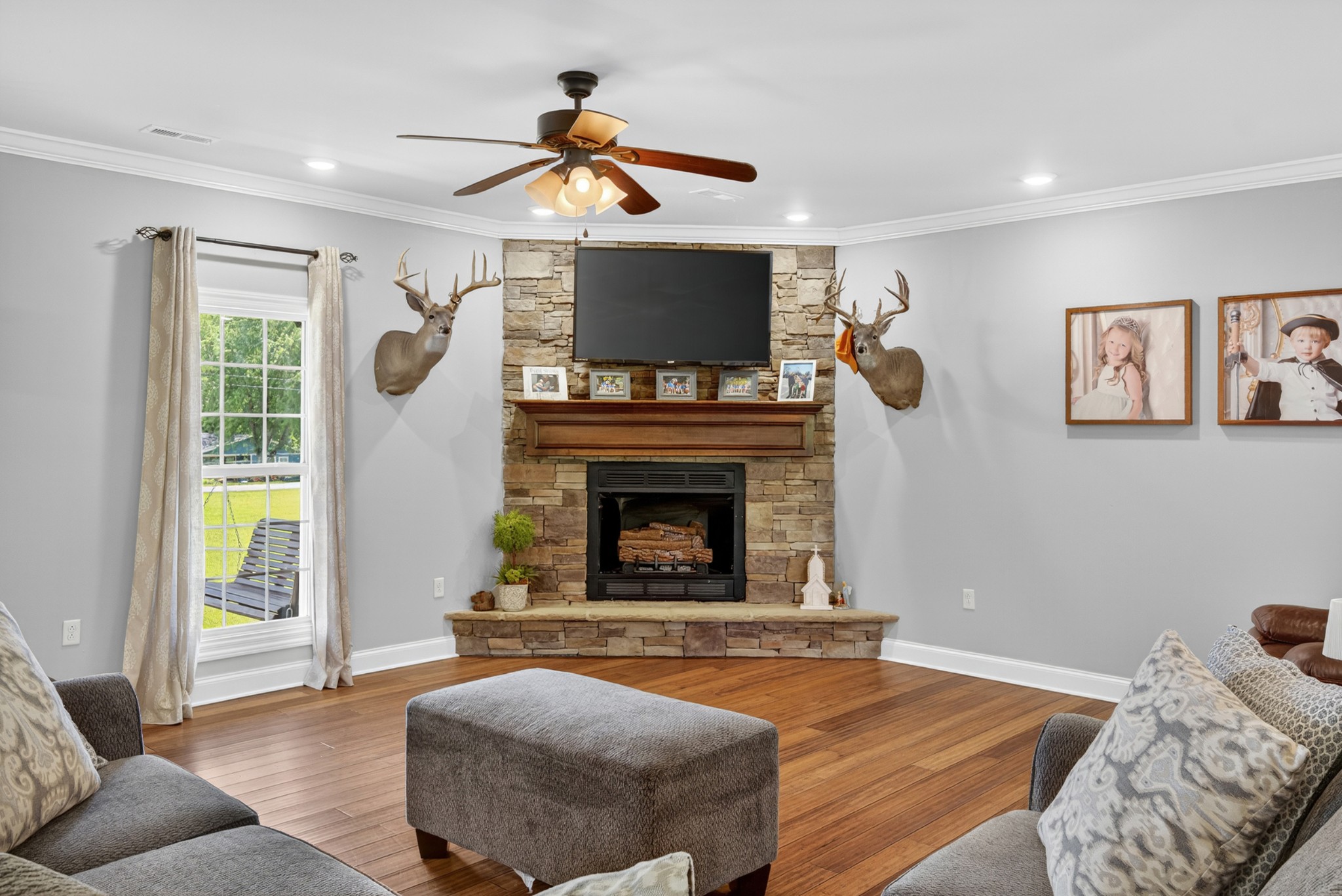86 L Mitchell Road Kelso, TN 37348 - Photo 7 of 49 a living room with furniture and a fireplace