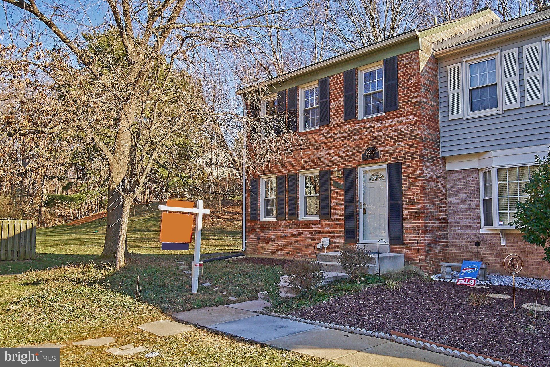 Lovely end-unit backing and siding to common area
