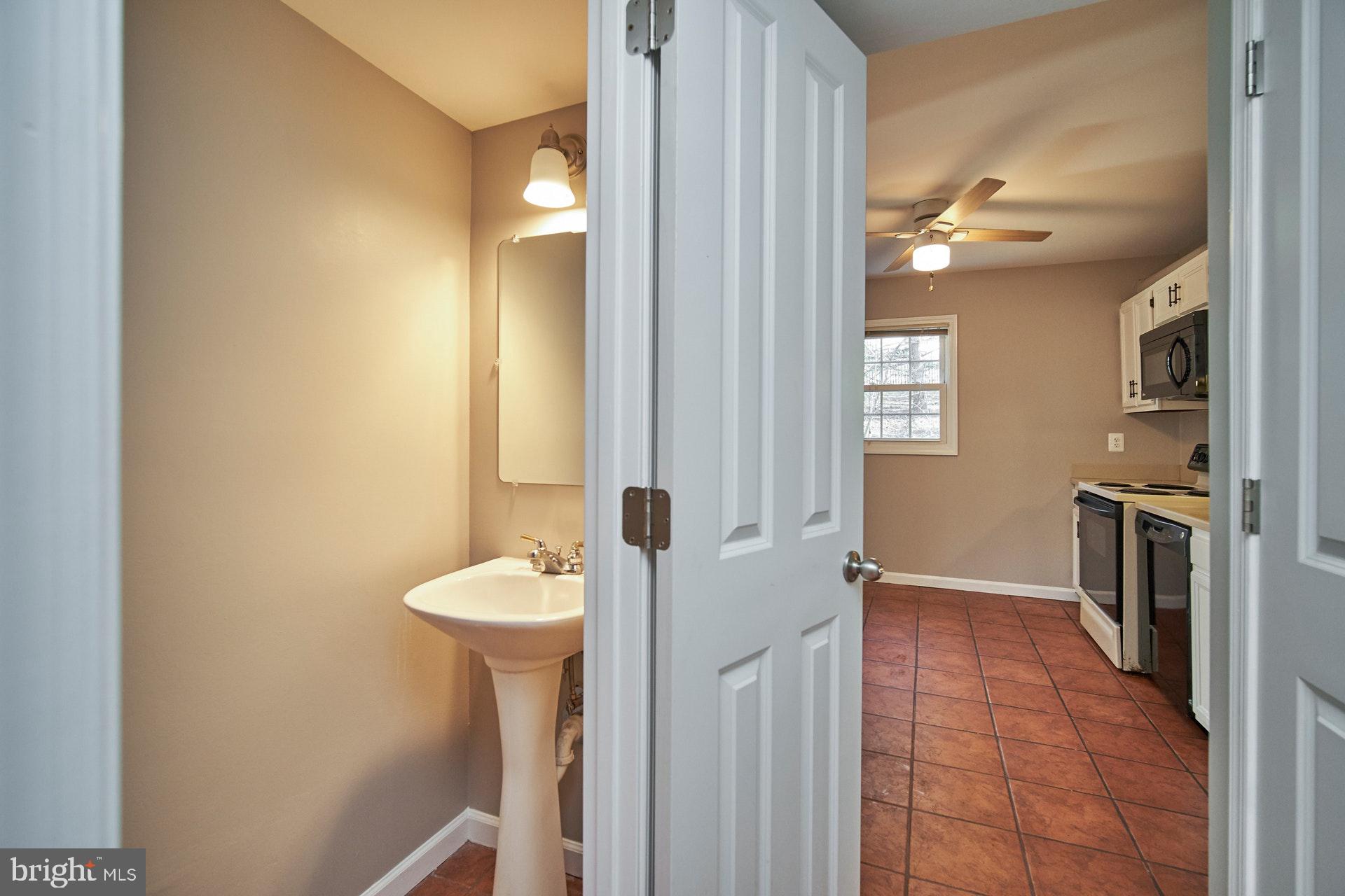 8339 Moline Place Springfield, VA 22153 - Photo 13 of 32 Main level powder room