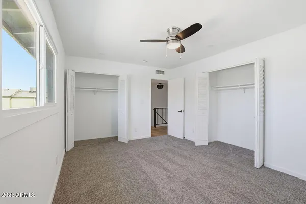 a view of empty room with windows