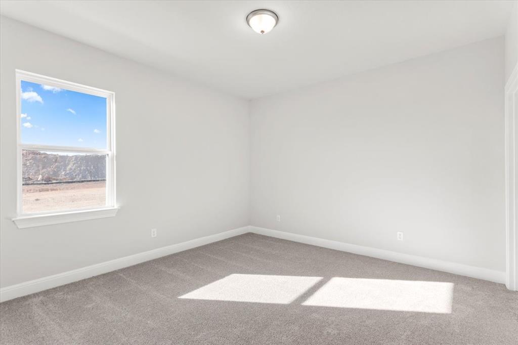 100 Plumfield Cove Georgetown, TX 78628 - Photo 24 of 40 an empty room with a window