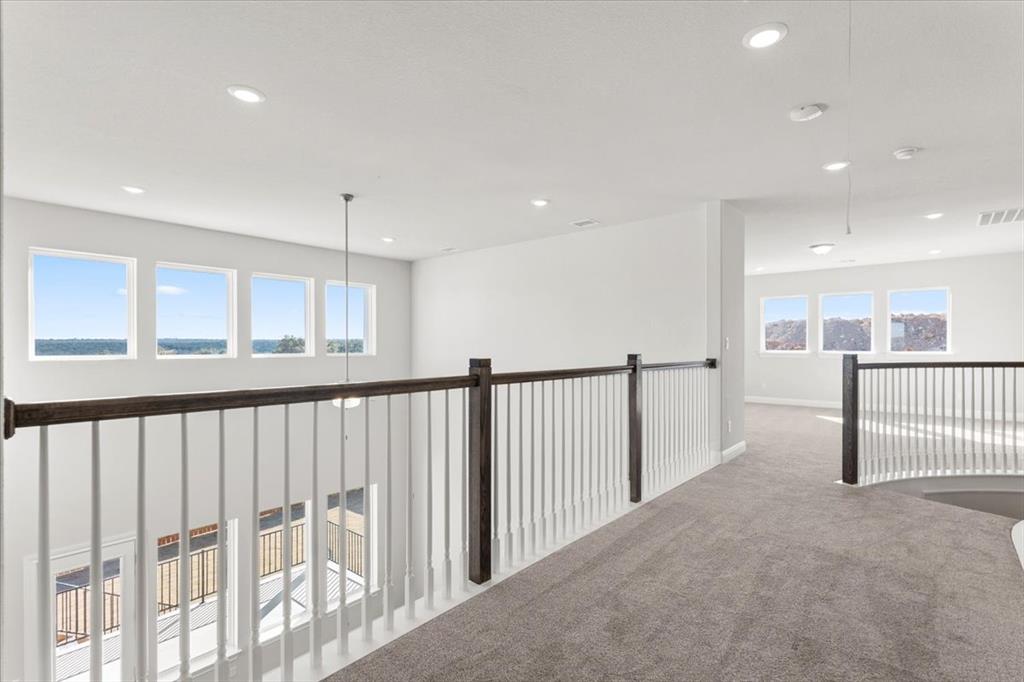 100 Plumfield Cove Georgetown, TX 78628 - Photo 31 of 40 a view of staircase with large window