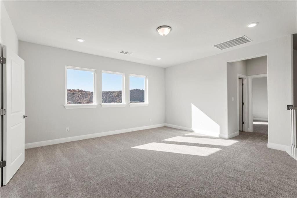 100 Plumfield Cove Georgetown, TX 78628 - Photo 36 of 40 a view of an empty room with a window