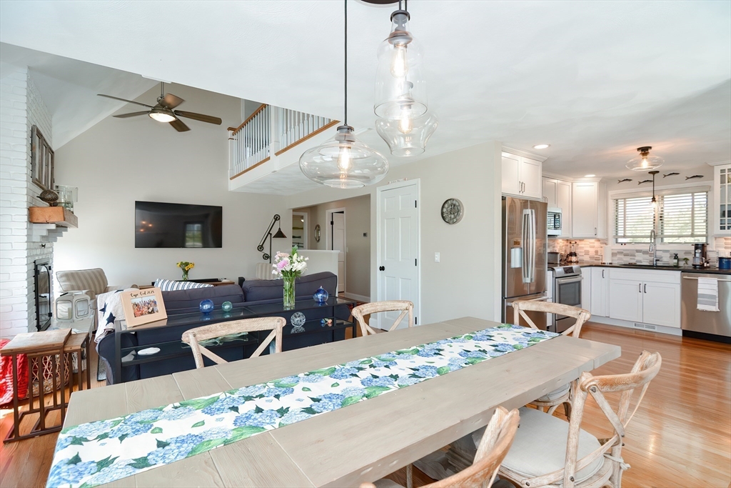 308 Phillips Road Sandwich, MA 02563 - Photo 13 of 42 a living room with furniture and a flat screen tv
