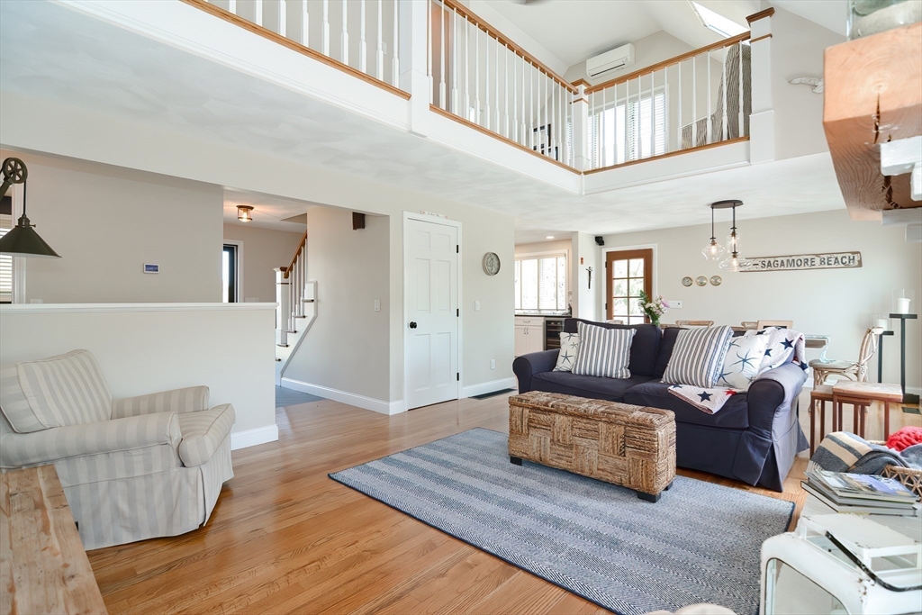 308 Phillips Road Sandwich, MA 02563 - Photo 16 of 42 a living room with furniture and a wooden floor