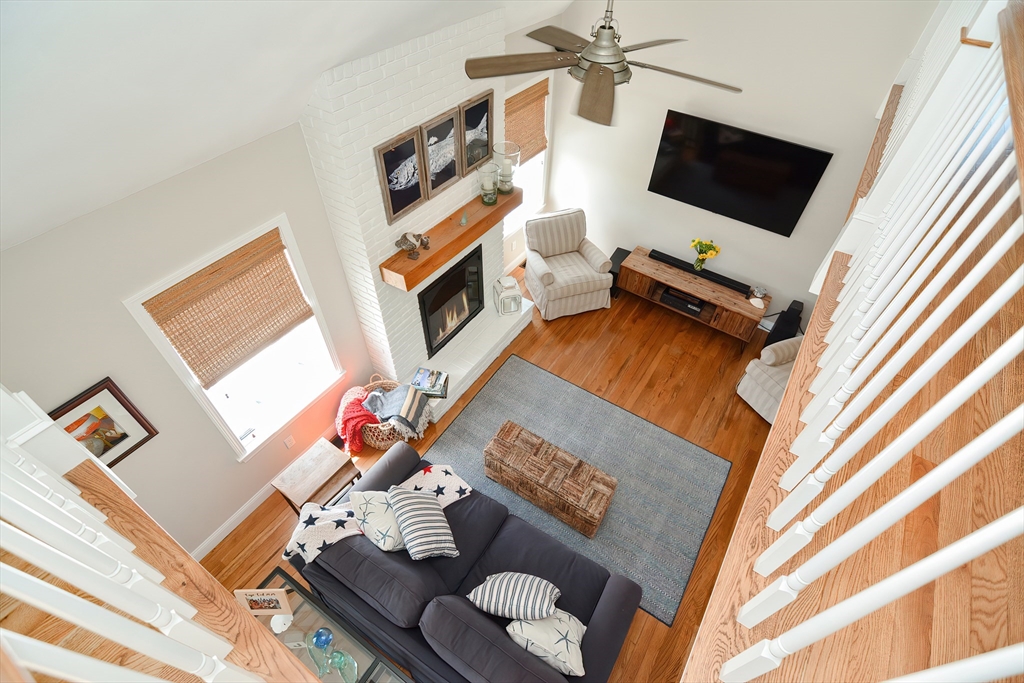 308 Phillips Road Sandwich, MA 02563 - Photo 17 of 42 a living room with furniture and a flat screen tv