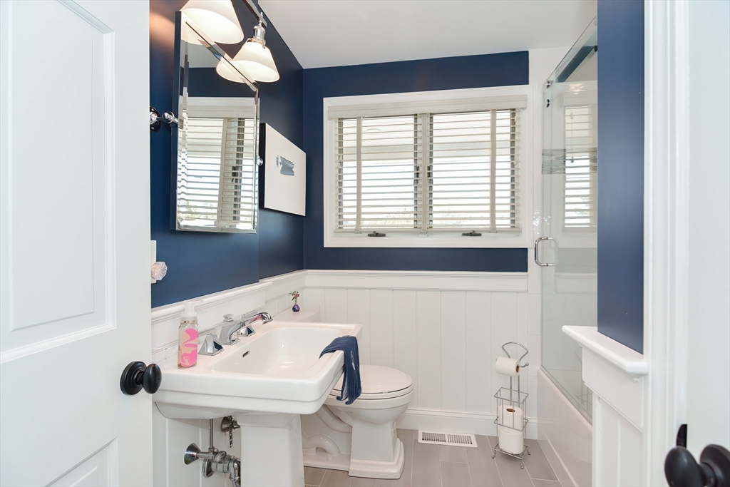 308 Phillips Road Sandwich, MA 02563 - Photo 20 of 42 a bathroom with a sink and a toilet