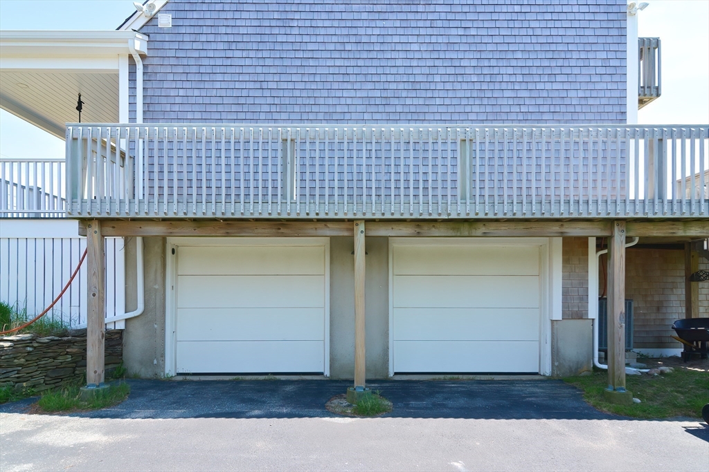308 Phillips Road Sandwich, MA 02563 - Photo 37 of 42 a front view of a house with garage