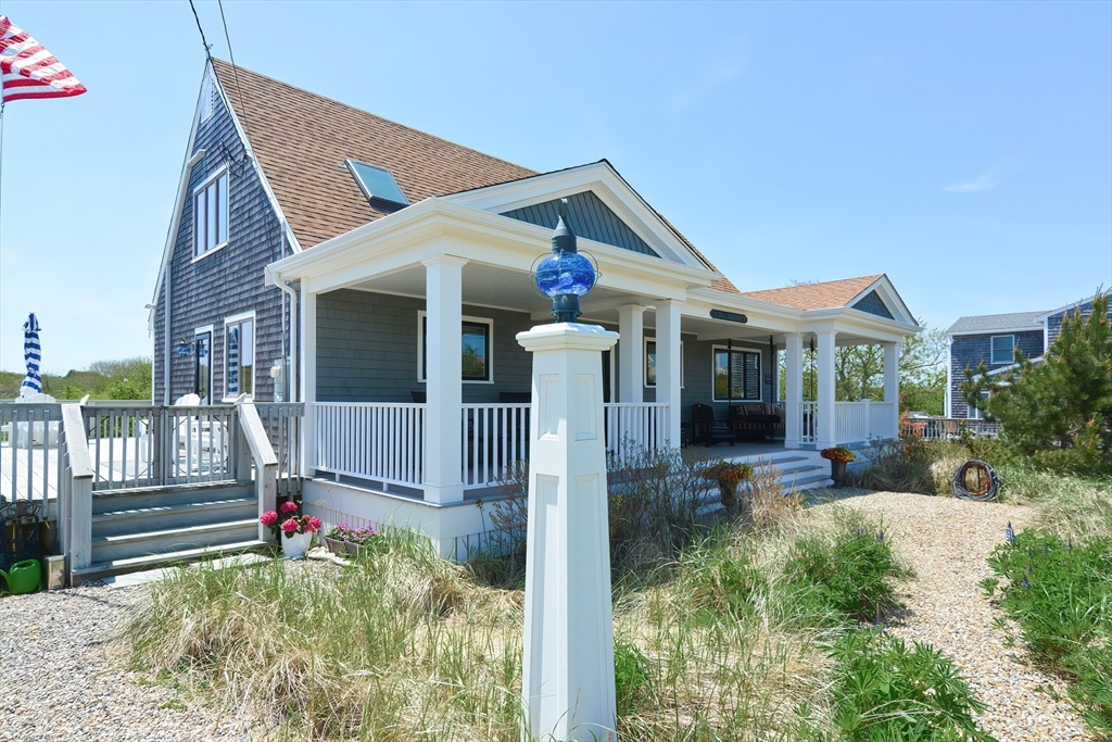 308 Phillips Road Sandwich, MA 02563 - Photo 38 of 42 a front view of a house with a yard