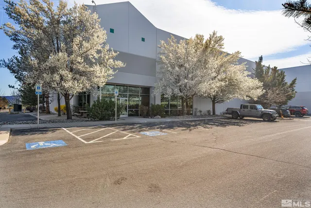a view of road with houses