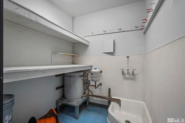 a room with storage and utility