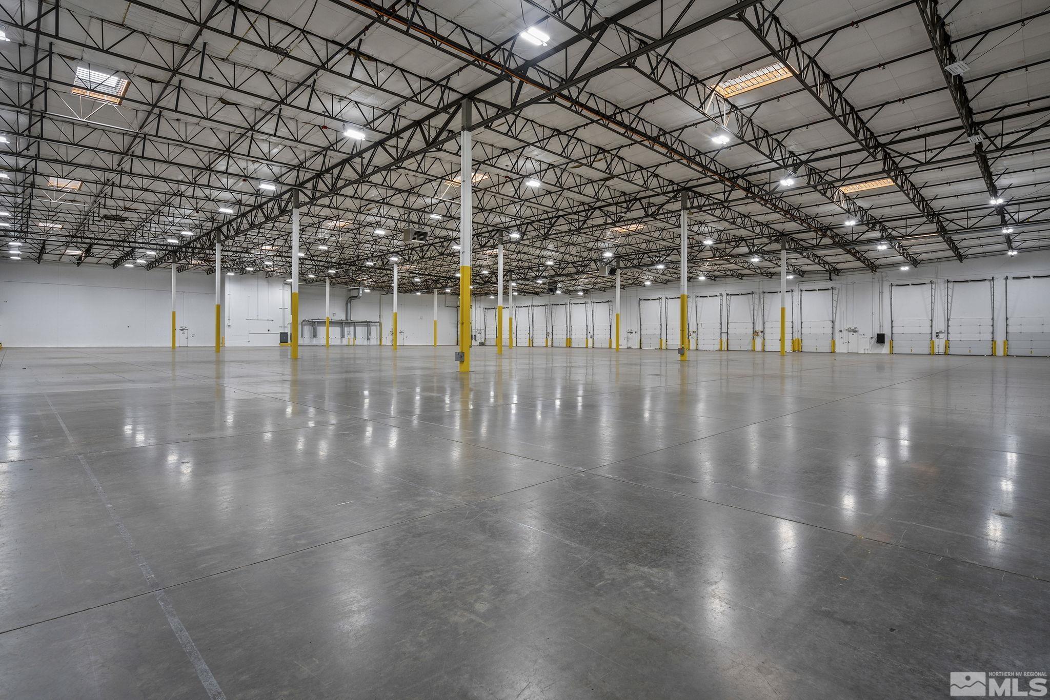 12815 Old Virginia Road Reno, NV 89521 - Photo 15 of 20 a view of an empty room with wooden floor