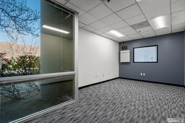 a view of a livingroom with wooden floor
