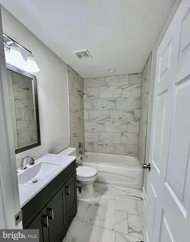 a view of balcony with wooden fence and floor