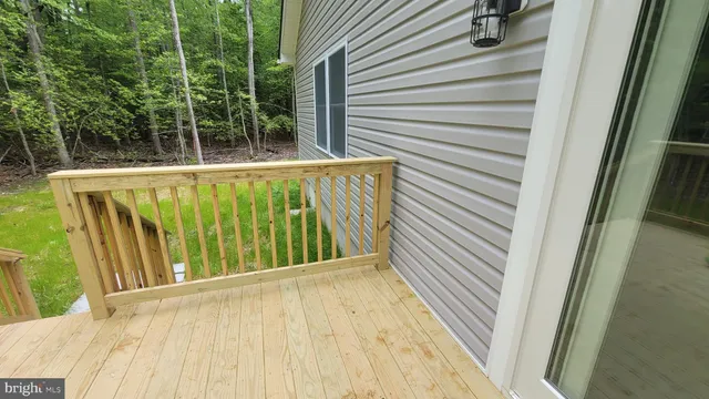 a view of a backyard with swimming pool