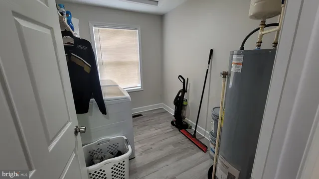 a view of entryway with wooden floor