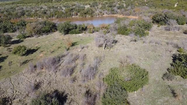 954 R Frog Branch Court Graford, TX 76449 - Photo 16 of 21 a view of a forest with a forest