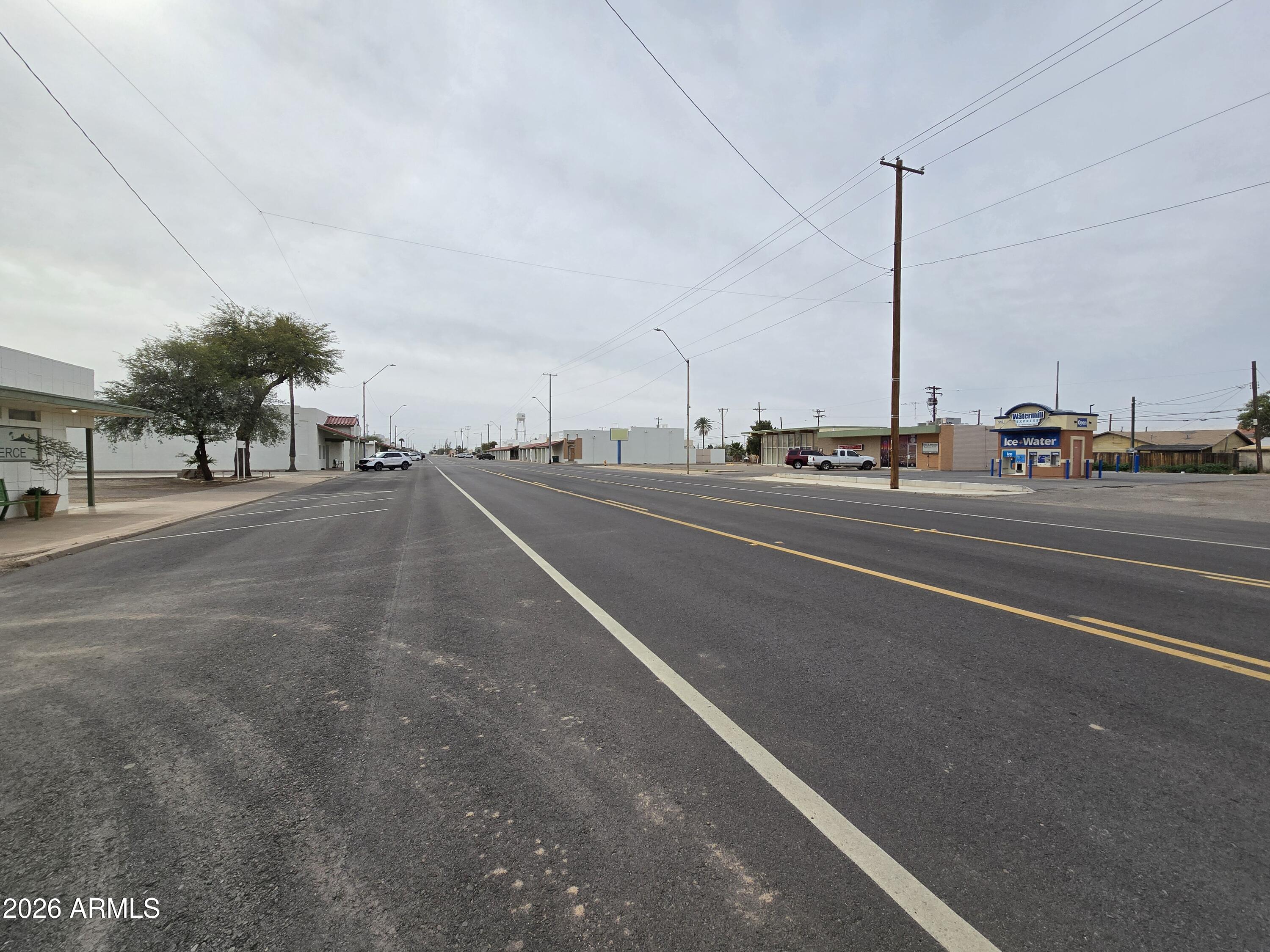 514 North Main Street, Unit 12 Eloy, AZ 85131 - Photo 3 of 10 a view of a city street with a road
