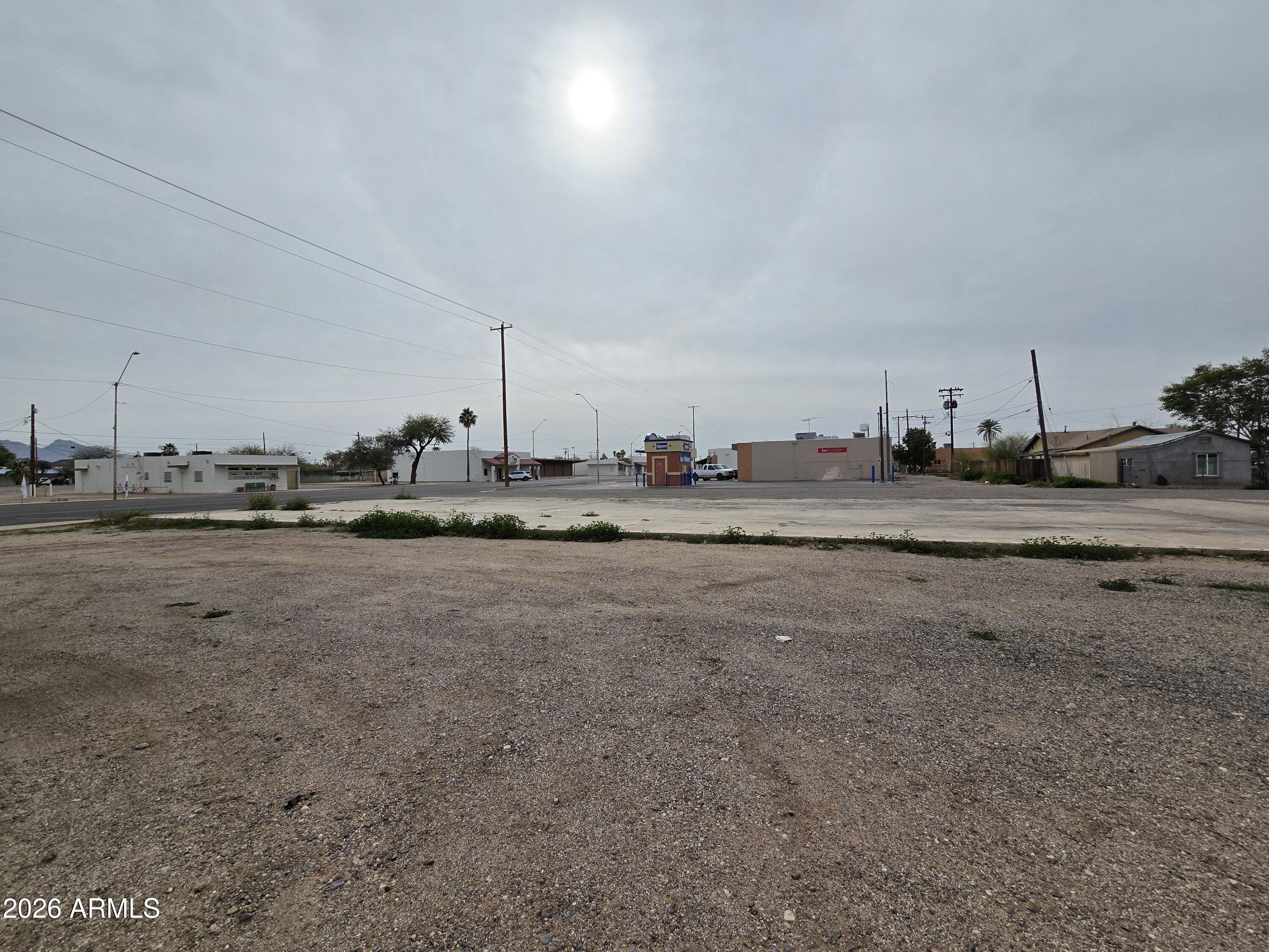 514 North Main Street, Unit 12 Eloy, AZ 85131 - Photo 6 of 10 a view of a road with an empty space