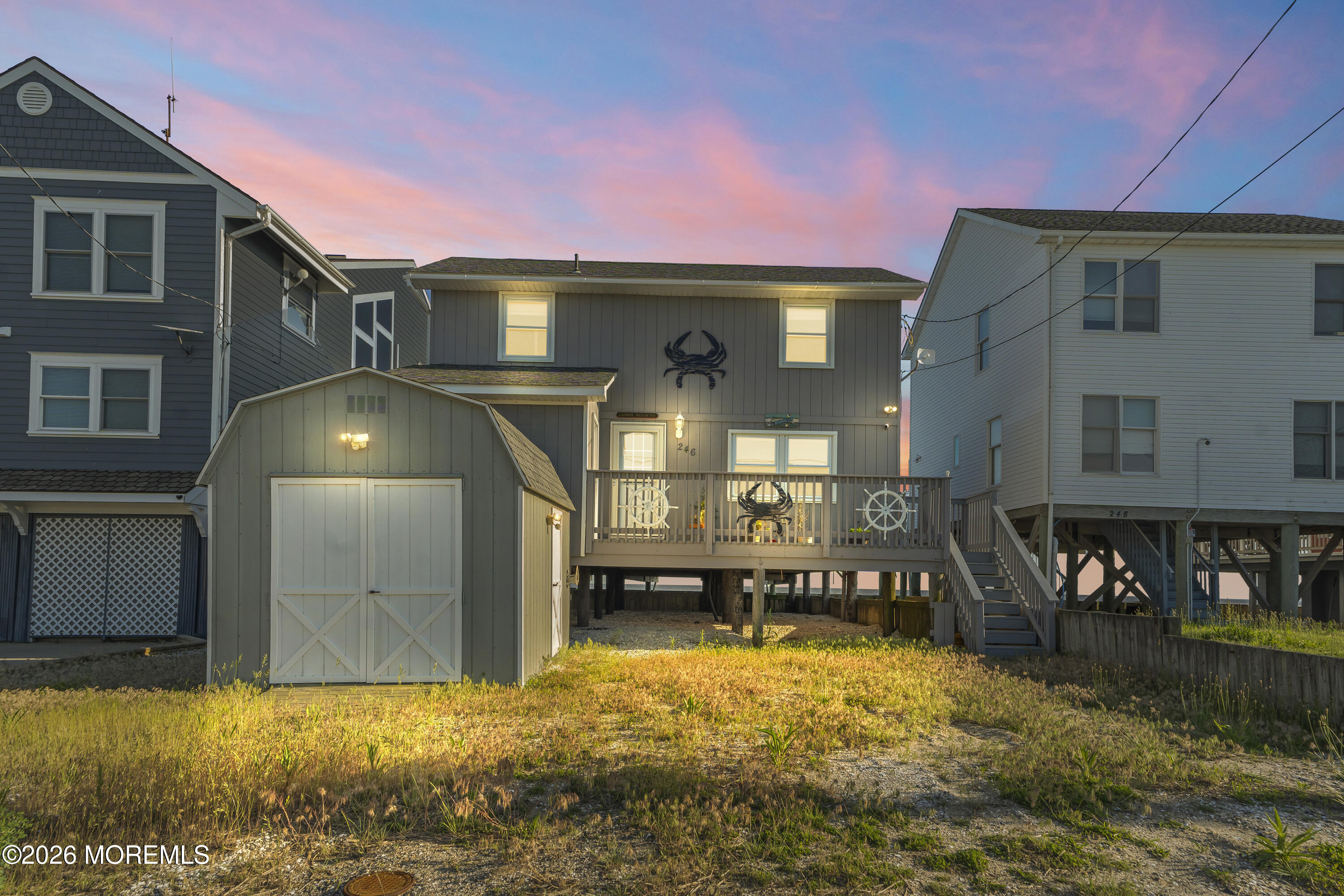 246 Cove Road Newport, NJ 08345 - Photo 1 of 21 a front view of a house with a yard