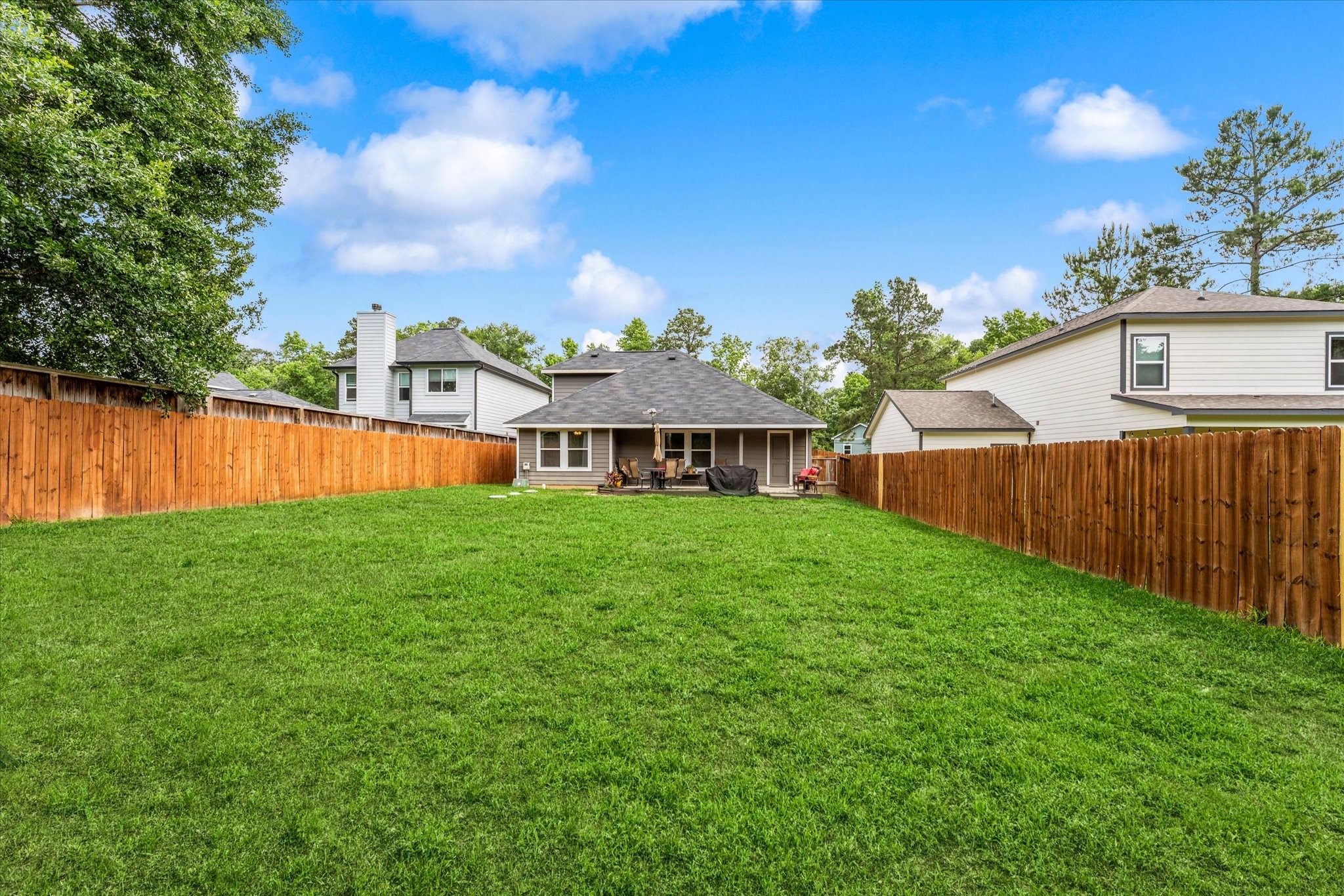 3998 Frontier Road Willis, TX 77378 - Photo 31 of 33 a view of a house with a yard