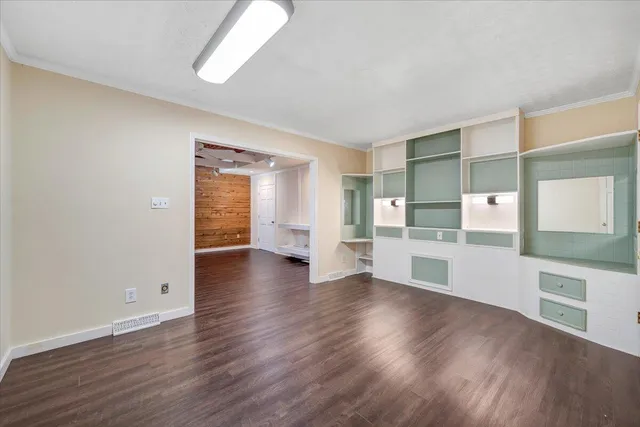 a view of a kitchen with washer and dryer