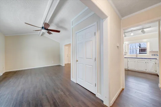 wooden floor in an empty room and a window