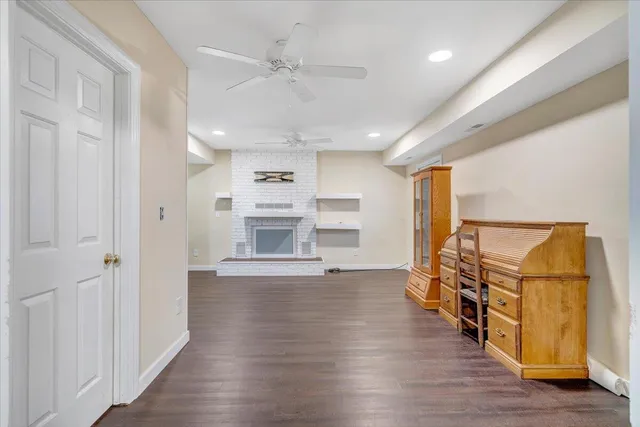 a view of a backyard with a snow on the road