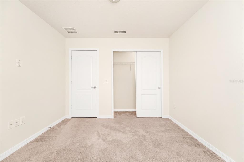 7513 Oak Spring Lane Davenport, FL 33837 - Photo 18 of 40 a view of an empty room