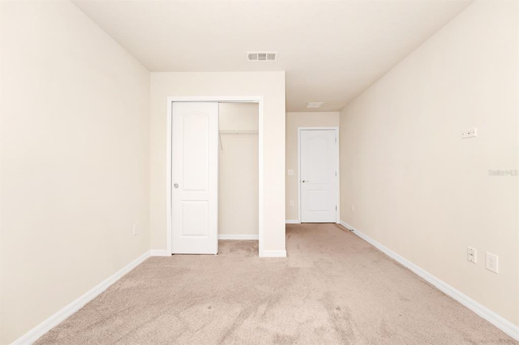 7513 Oak Spring Lane Davenport, FL 33837 - Photo 21 of 40 a view of an empty room