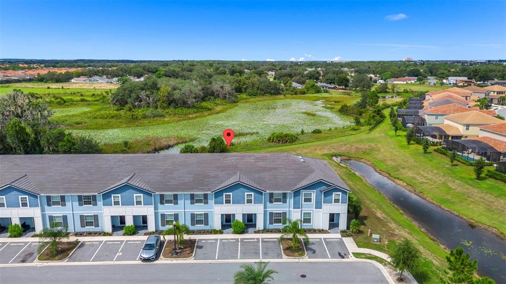 7513 Oak Spring Lane Davenport, FL 33837 - Photo 28 of 40 a aerial view of a house with a big yard