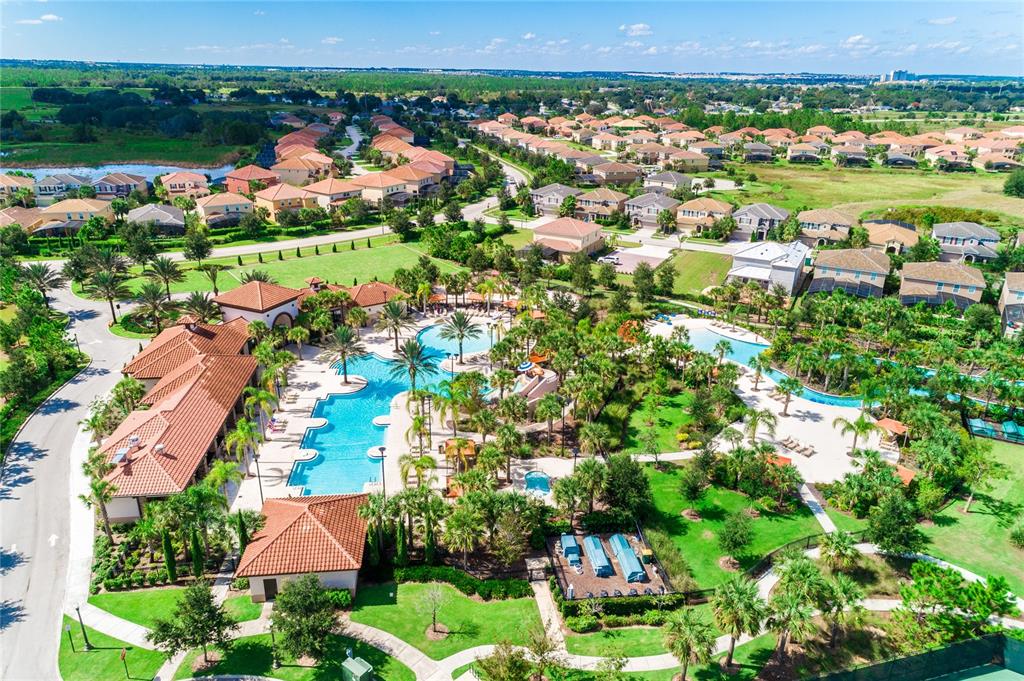 7513 Oak Spring Lane Davenport, FL 33837 - Photo 39 of 40 an aerial view of a houses with a yard and lake view