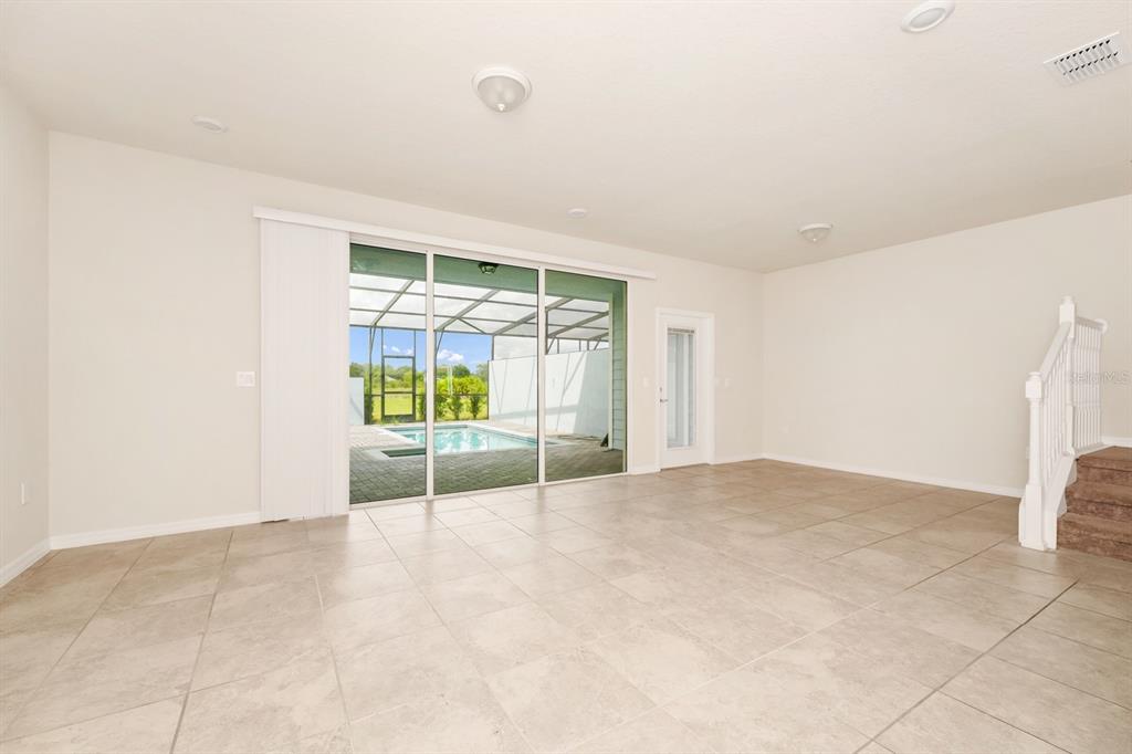 7513 Oak Spring Lane Davenport, FL 33837 - Photo 9 of 40 an empty room with windows