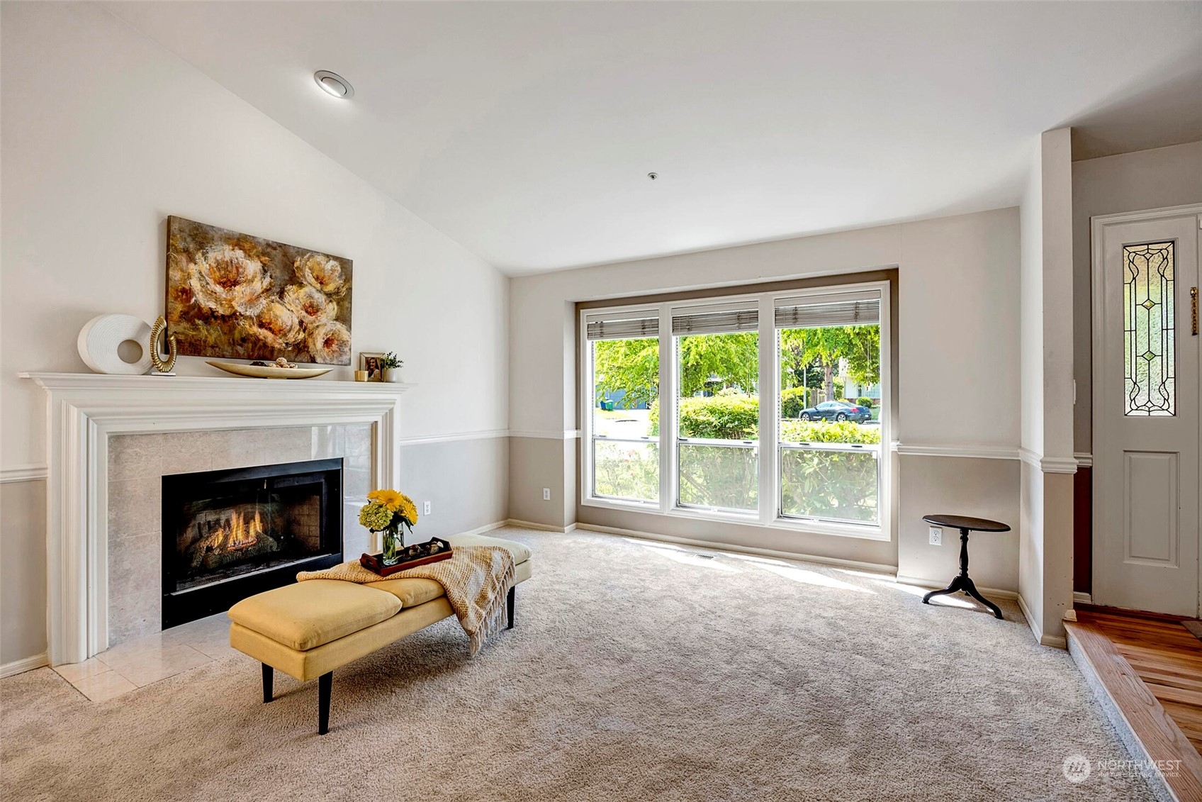 4516 Northeast 26th Court Renton, WA 98059 - Photo 3 of 28 a living room with furniture and a fireplace