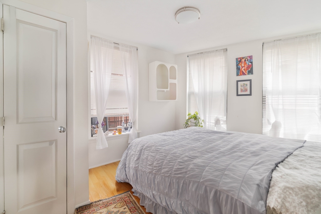 5 North Margin Street, Unit 5 Boston, MA 02113 - Photo 6 of 15 a bedroom with a bed and a window