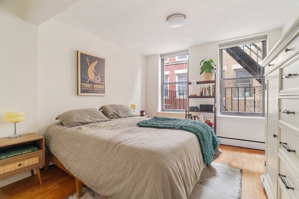 5 North Margin Street, Unit 5 Boston, MA 02113 - Photo 7 of 15 a spacious bedroom with a bed and a window