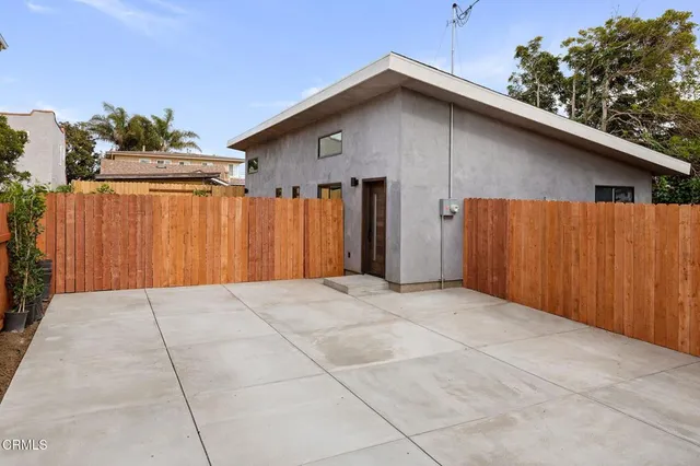 a front view of a house with a garage