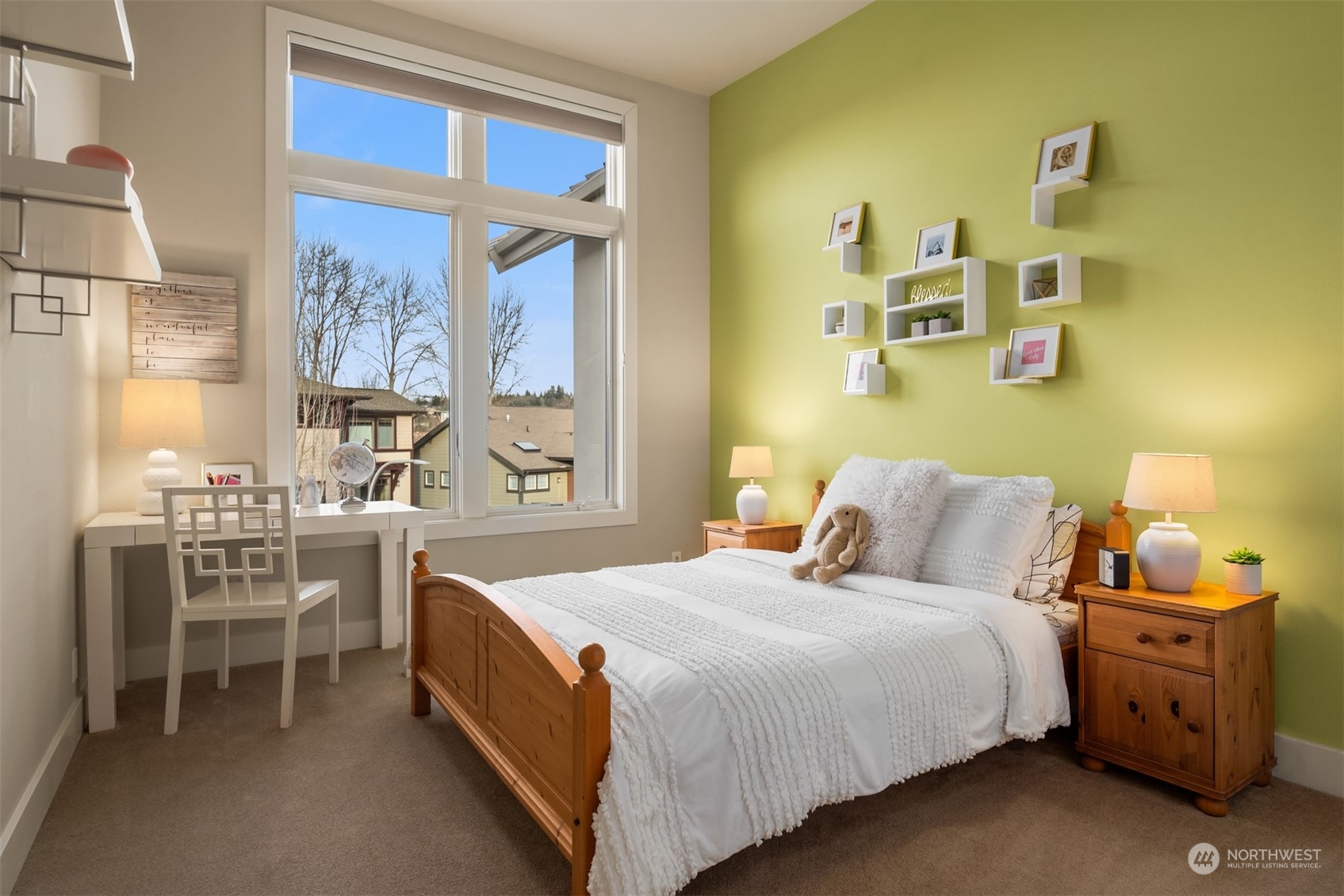 1019 North 42nd Place Renton, WA 98056 - Photo 13 of 33 a bedroom with a bed and a window