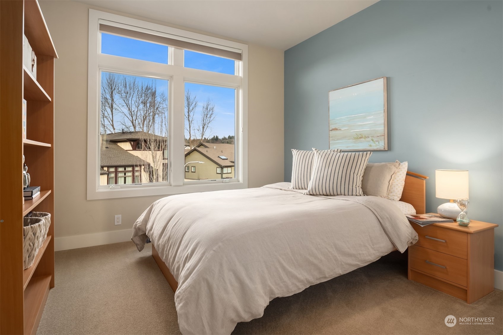 1019 North 42nd Place Renton, WA 98056 - Photo 14 of 33 a bedroom with a bed and a large window