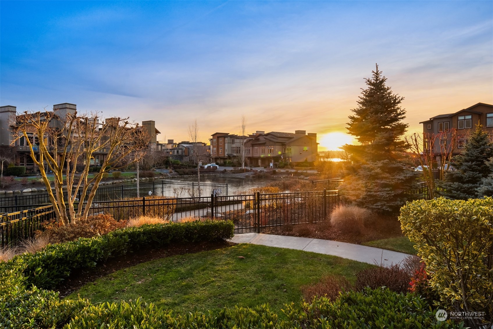 1019 North 42nd Place Renton, WA 98056 - Photo 22 of 33 a view of a lake with a yard