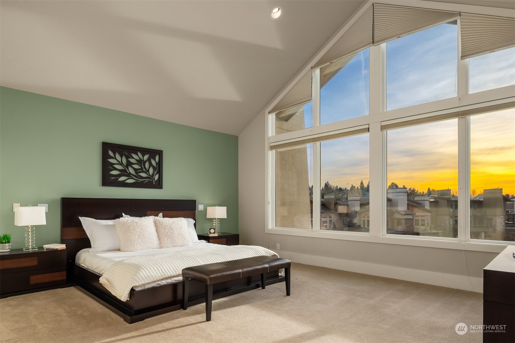 1019 North 42nd Place Renton, WA 98056 - Photo 10 of 33 a spacious bedroom with a large bed and a large window