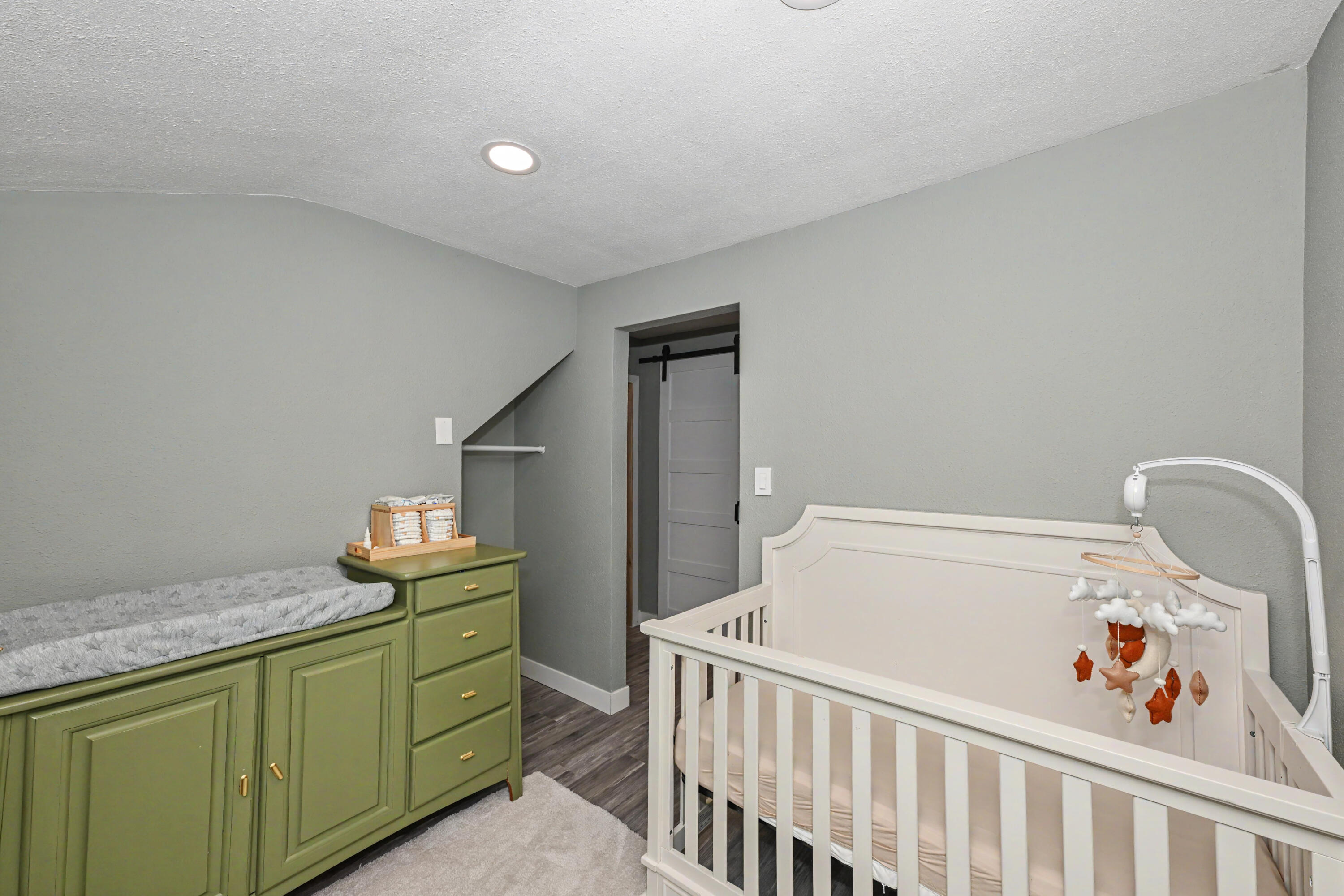 110 Polk Street Slinger, WI 53086 - Photo 18 of 28 This room is a pass through from the master suite. It can be an office or nursery