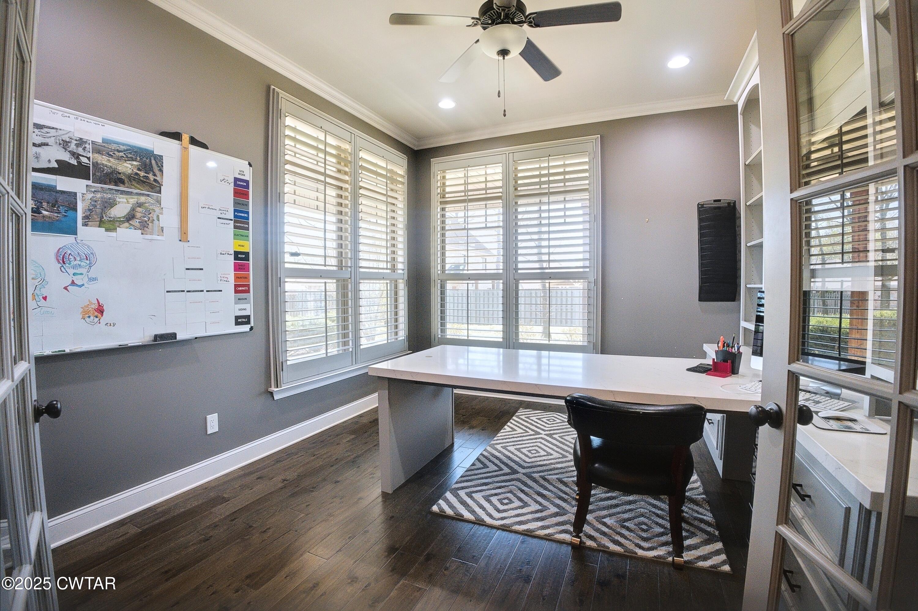 963 Ashport Road Jackson, TN 38305 - Photo 23 of 51 a room with stainless steel appliances kitchen island granite countertop a sink table and chairs