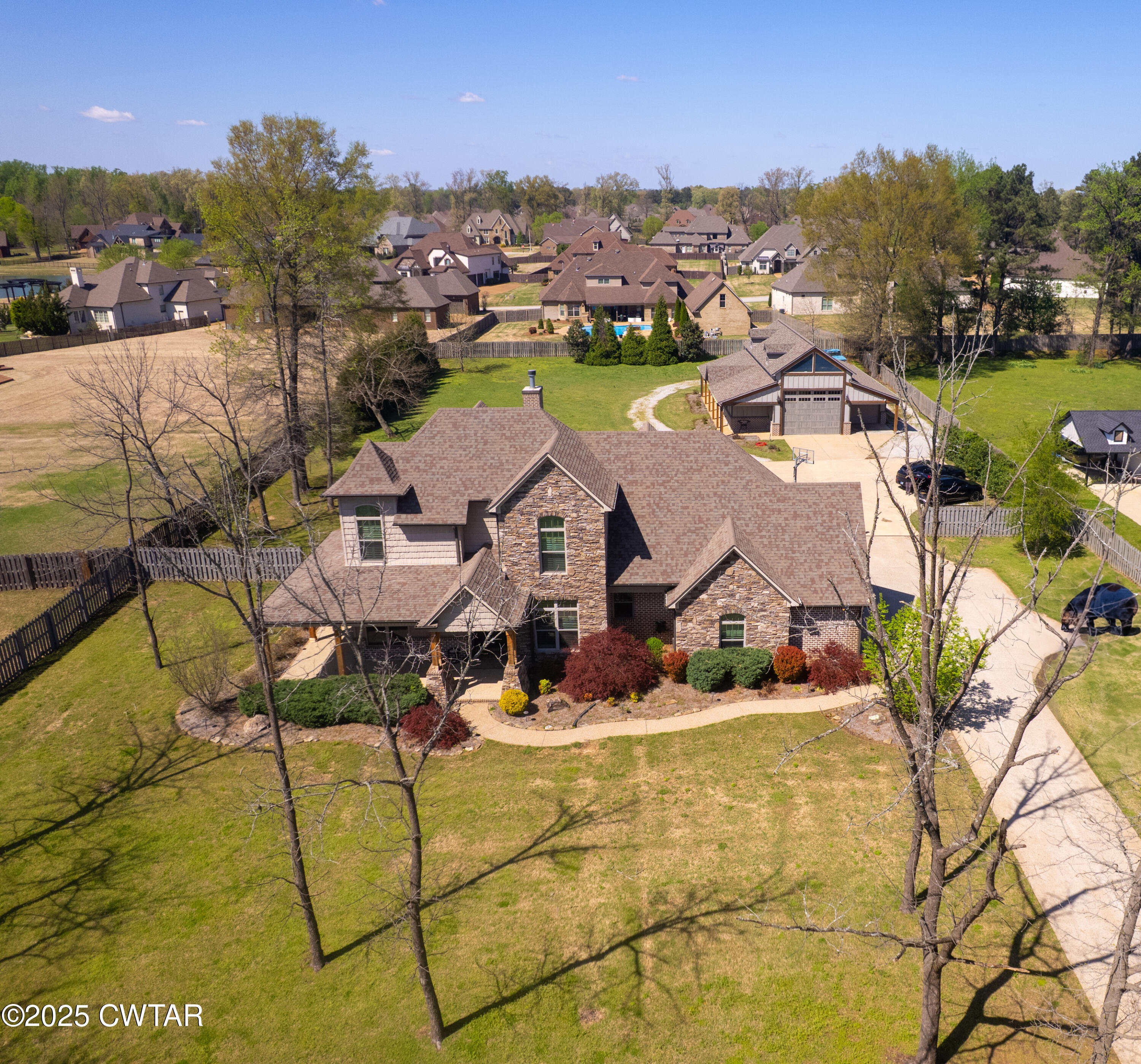 963 Ashport Road Jackson, TN 38305 - Photo 3 of 51 a view of residential houses with outdoor space and ocean view