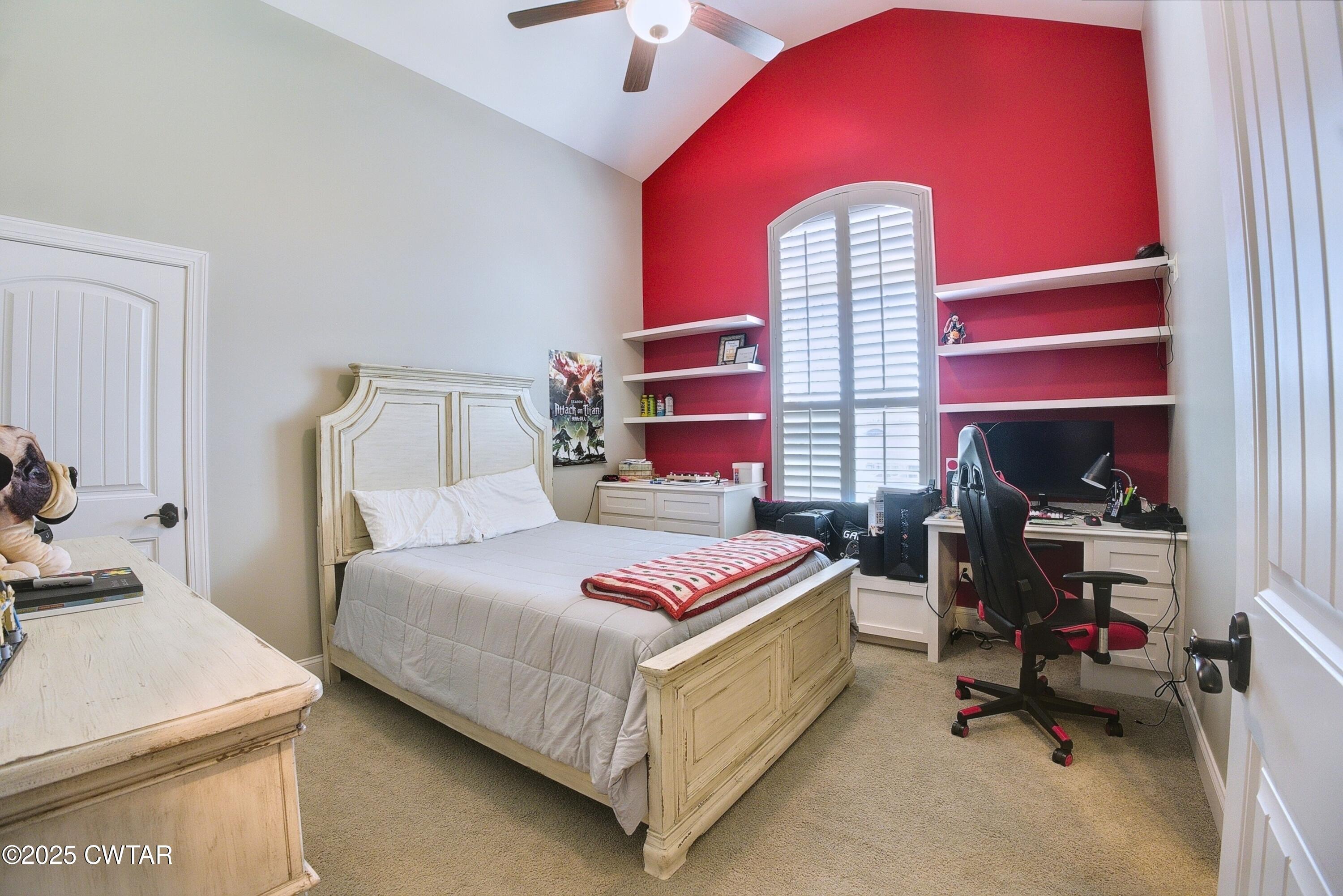 963 Ashport Road Jackson, TN 38305 - Photo 32 of 51 a bedroom with a bed and a dresser