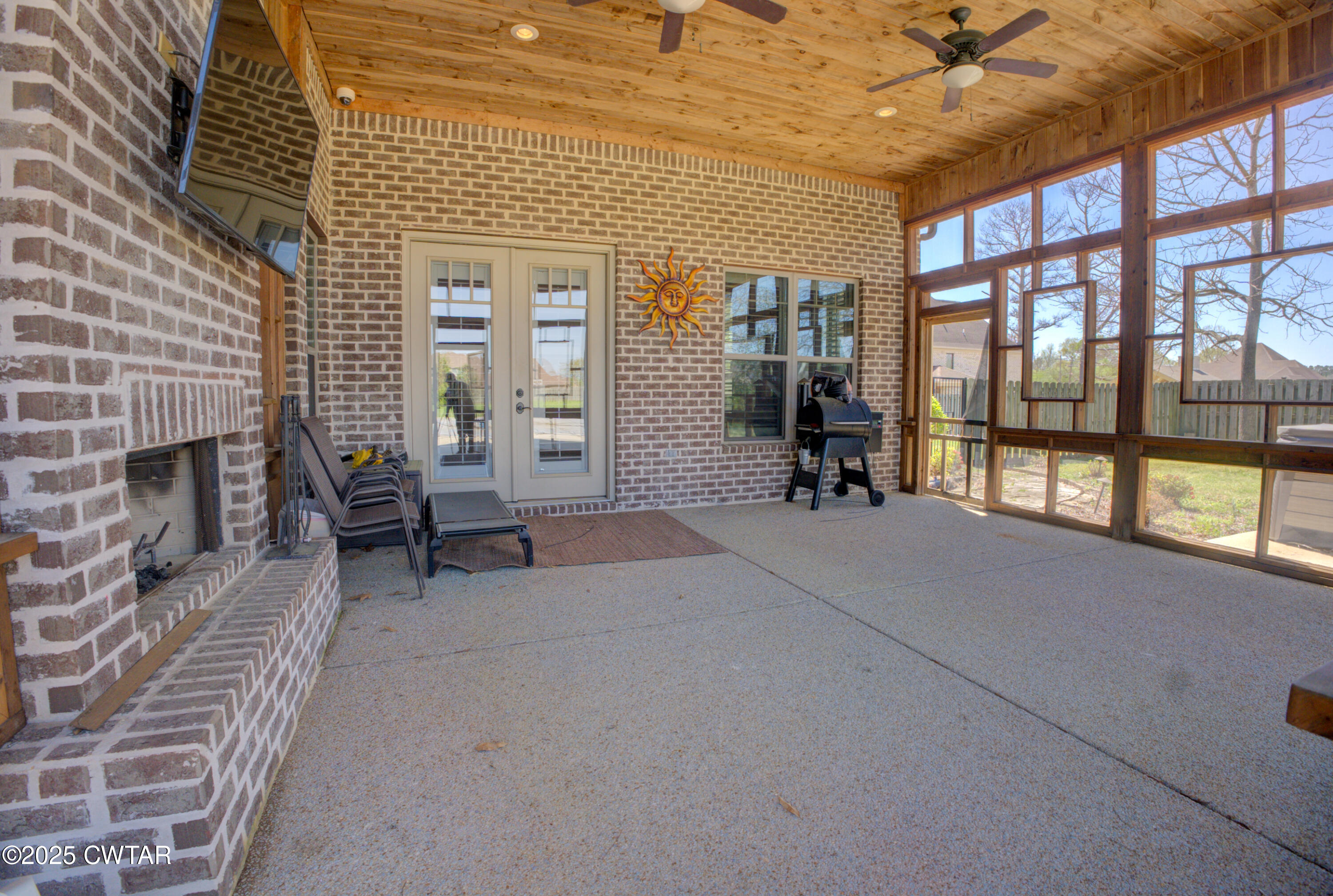 963 Ashport Road Jackson, TN 38305 - Photo 42 of 51 a living room with furniture and a fireplace